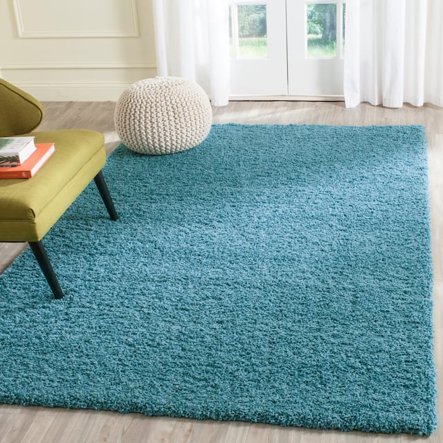 SAFAVIEH Laguna Shag Verdiana Solid Color 2-inch Thick Shag Rug - 5'3" x 7'6" - Turquoise