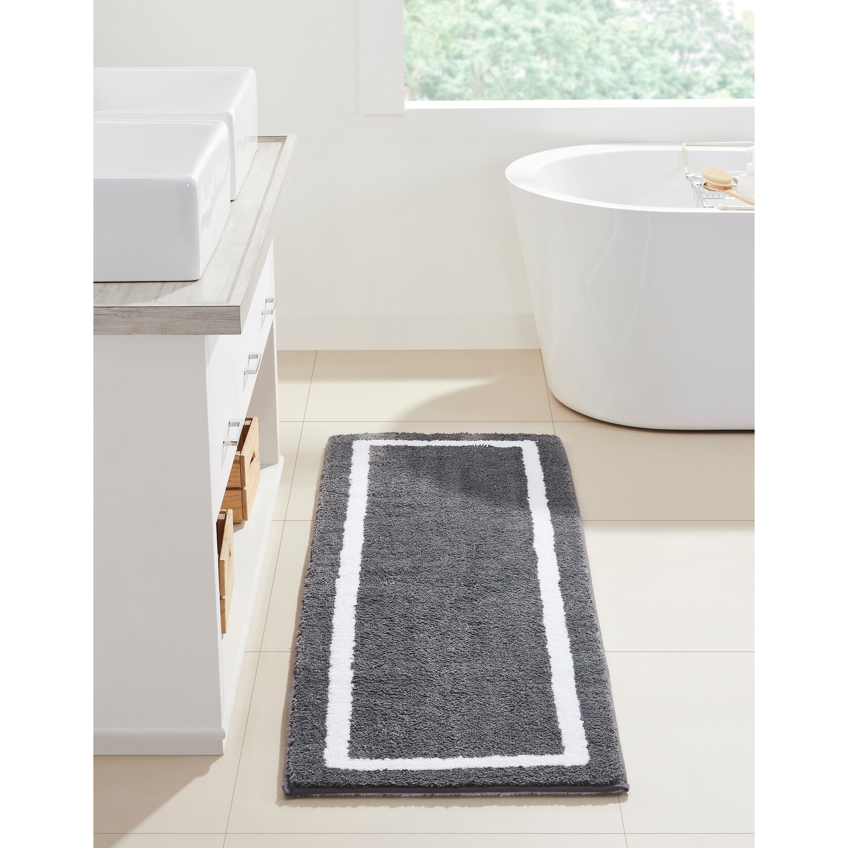 https://ak1.ostkcdn.com/images/products/is/images/direct/ffbf1ae0df3874fed2405bfb4b4773847866e498/Better-Trends-Pegasus-Tufted-Reversible-Bath-Mat-Rug-100%25-Polyester.jpg