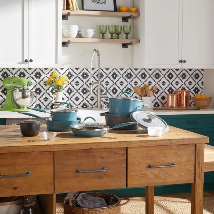 Contemporary kitchen with assorted pots, appliances, and kitchen tools available at Overstock