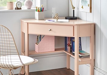 Corner desk with drawer and under-desk shelf storage