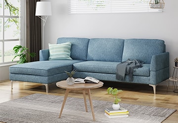 Blue sectional sofa in a small living room