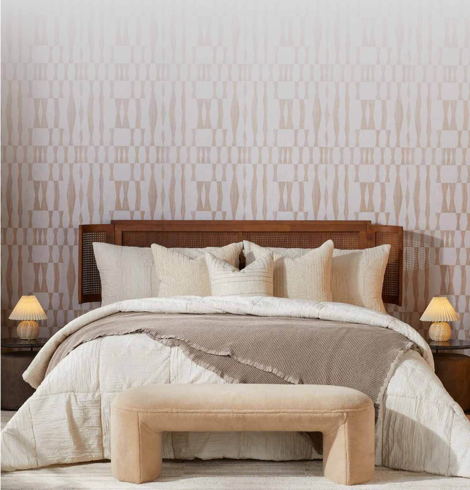 A bedroom with a king size bed, plenty of pillows and plush bedding available online at Overstock.