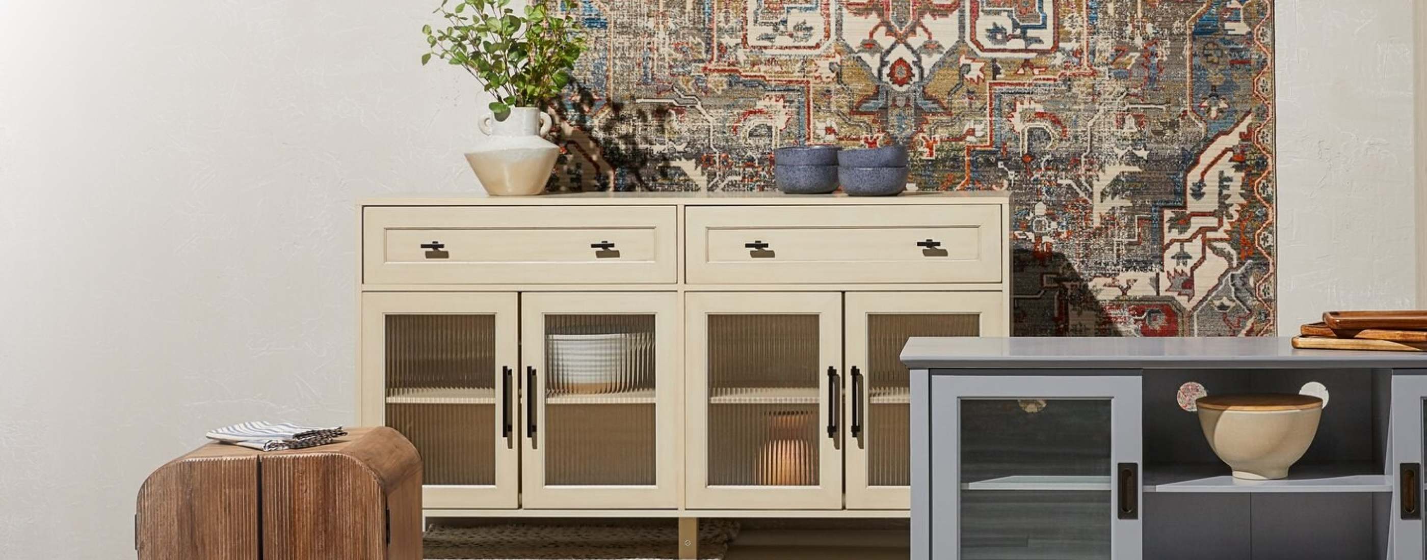 Two low cabinets with glass doors and organized dishes inside online with other storage and organization furniture at Overstock