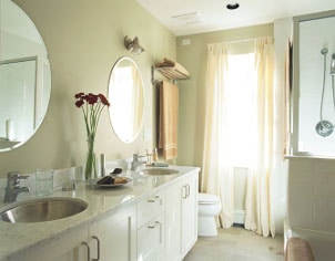 Double vanity sinks in a marble countertop