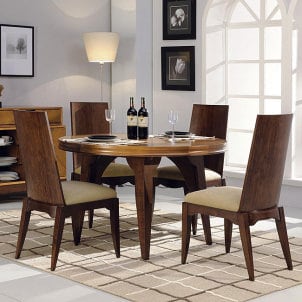 Round hardwood dining table with four chairs