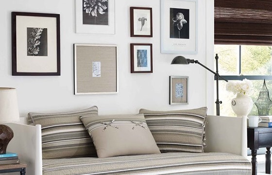 Get Inspired by These Fresh Coastal Furniture & Decor Ideas  Daybed with gallery wall