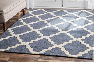 Prolong the Life of Your Rug Blue and cream rug with settee and French doors