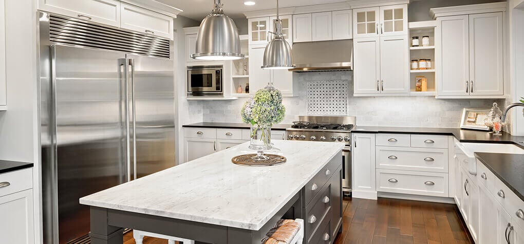 Considerations Large kitchen with stainless steel appliances, and large kitchen island