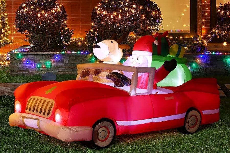 Santa in a Red Car Inflatable