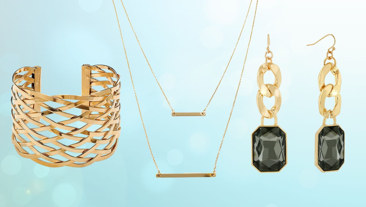 A collage of gold-plated jewelry; a necklace, a bracelet, and a set of earrings.