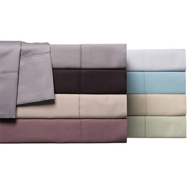 What to Consider When Buying Egyptian Cotton Sheets Stack of colorful Egyptian cotton sheets