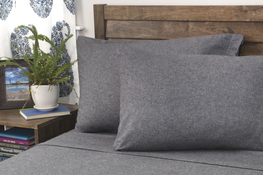 Grey Jersey knit sheets on a bed