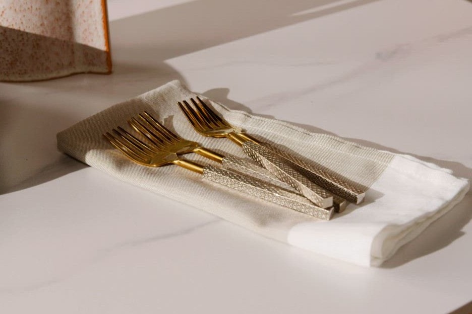 Closeup of a napkin with forks on it