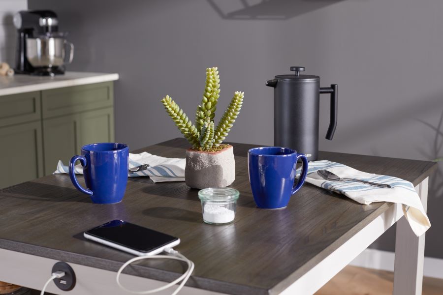 Kitchen island with a phone charging