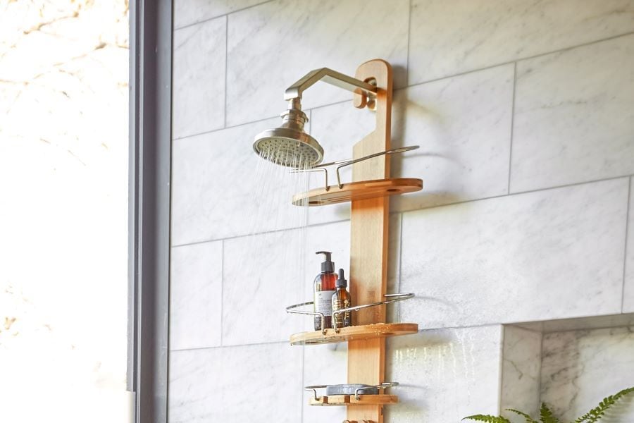 Shower head with a wooden shower caddy