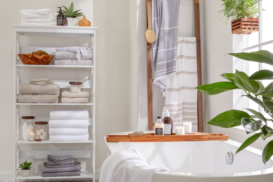 Bathtub with amenities nearby