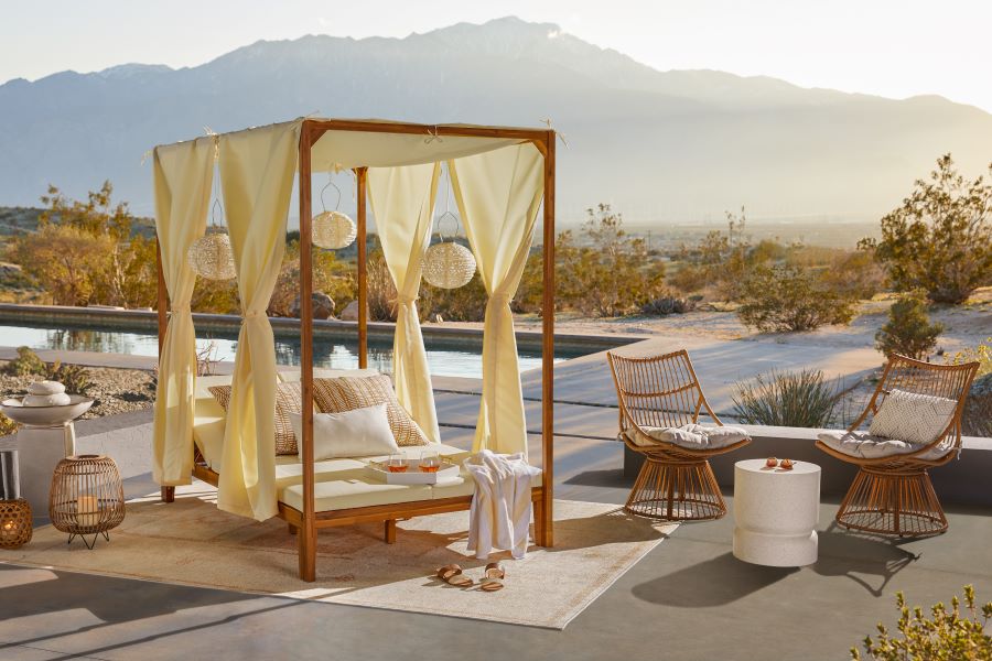 Daybed near swimming pool and chat set