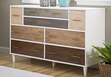 White dresser with drawers in various shades of brown