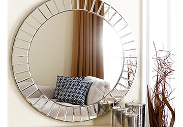 Round entryway mirror with stylized edges