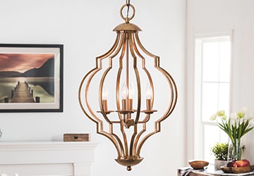 Polished gold chandelier with candelabra style lighting